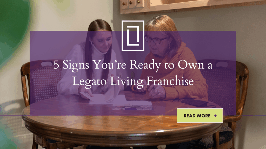 Franchise owner signs paperwork to operate senior care franchise.